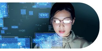 Woman interacting with futuristic digital technology and holograms.