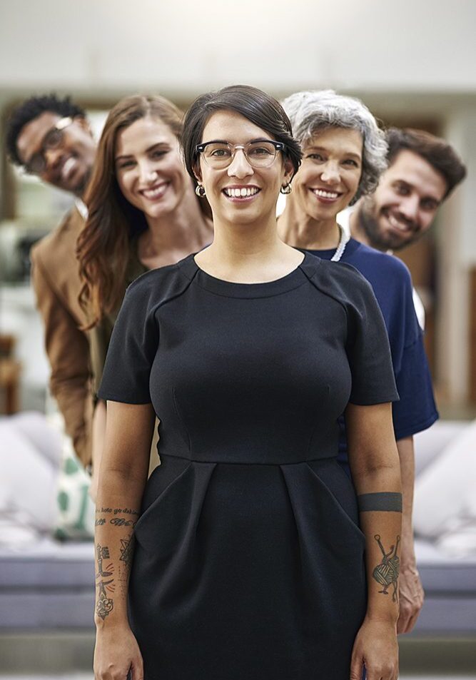 Smiling group of diverse people standing together.